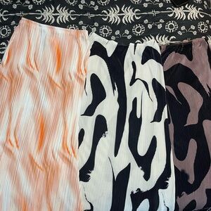 Set of Three Pleated Skirts in Orange, White, Black, and Brown